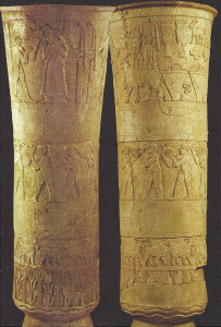 Esc, XXXIV-XXXII aC., Jarrn sagrado de Warka o Vaso de Uruk, alabastro, reconstruido, M. Nacional, Bagdad, Irak, 3400-3100